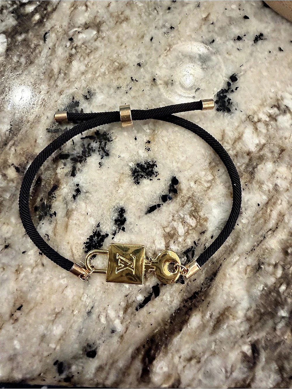 Fashion, “upcycled” LV Padlock Bracelet Black & Gold